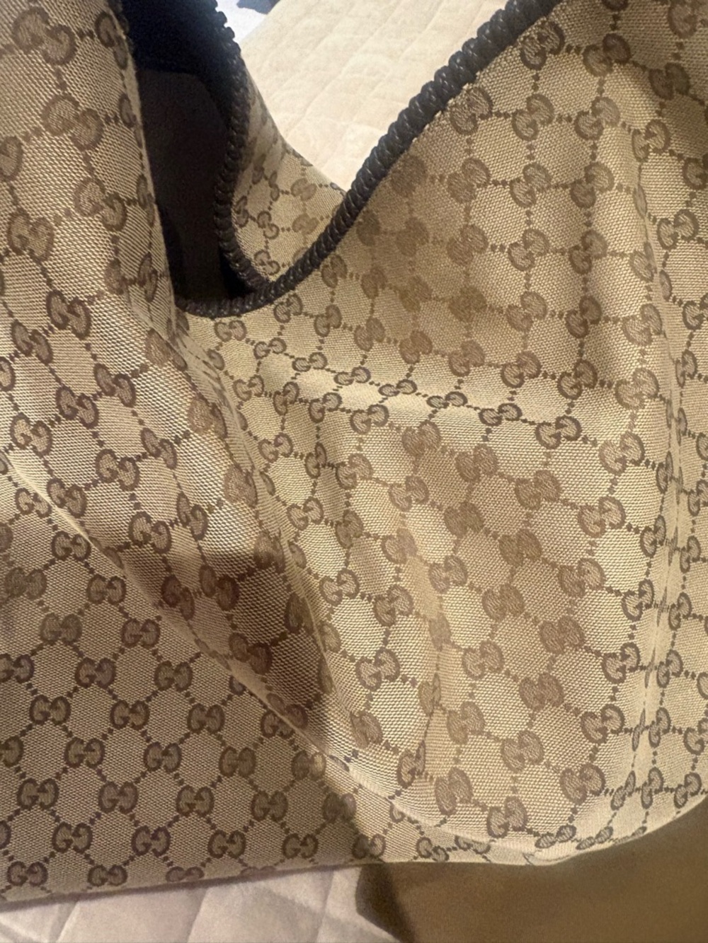 Gucci canvas hobo bag! Never worn.  Have original tag and receipt.